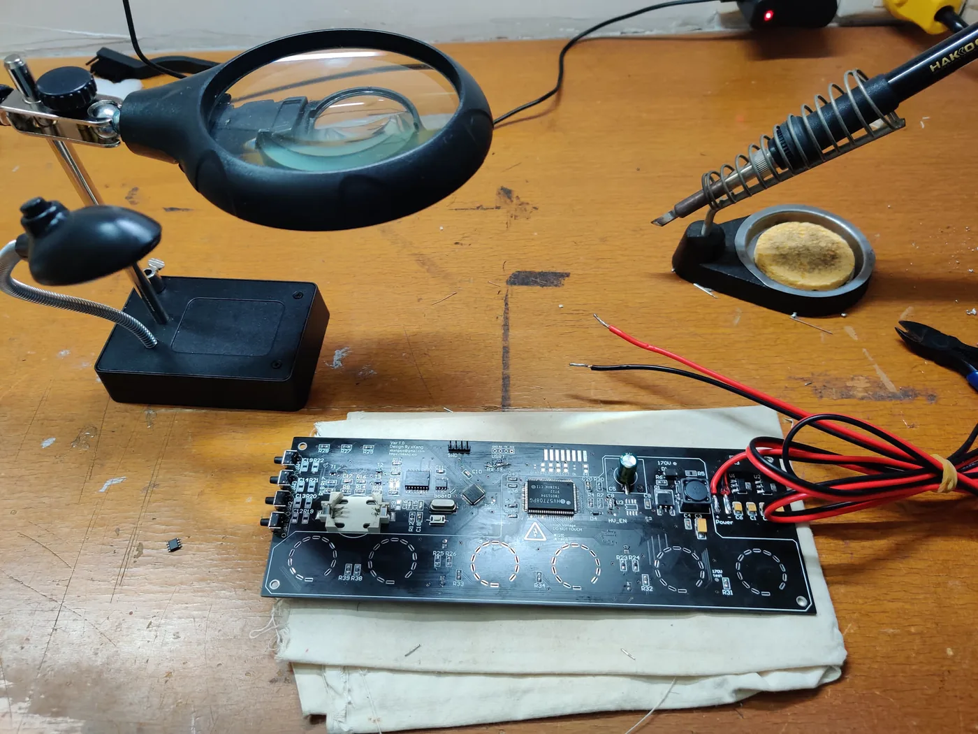 Hand SMD soldering and bench testing of custom PCB